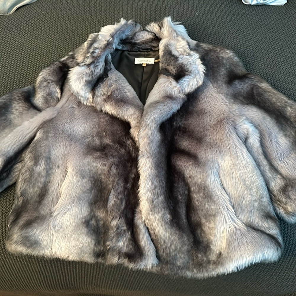 Brand new never worn Faux fur jacket  from CK very elegant